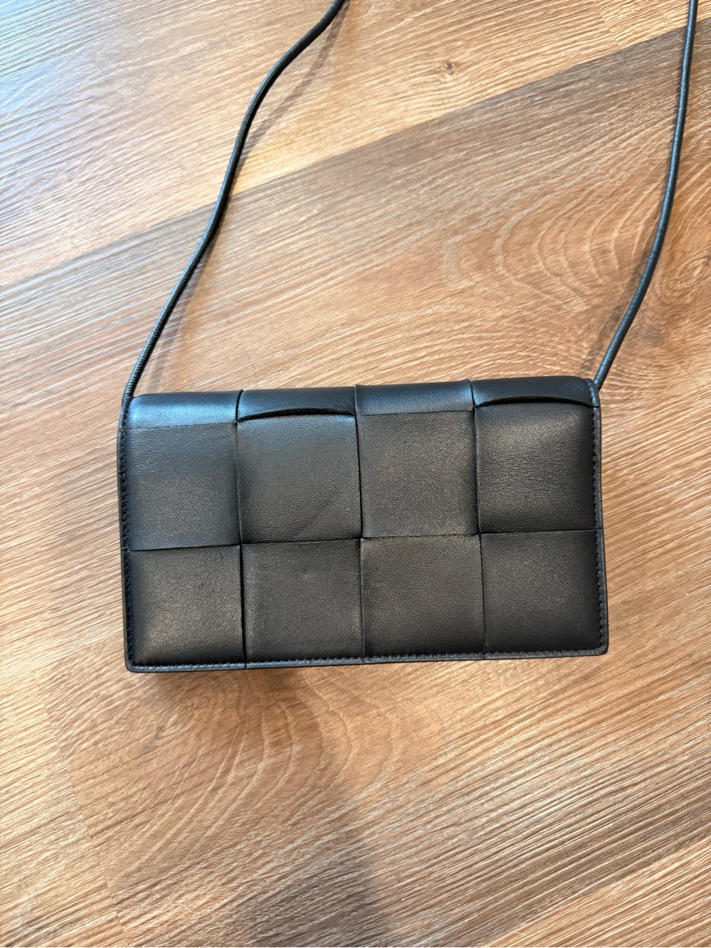 BOTTEGA VENETA Cassette black maxi woven intrecciato leather crossbody mini bag